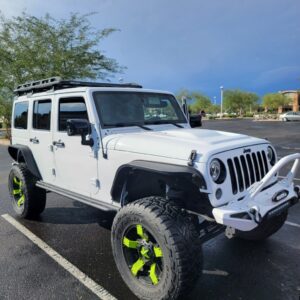 white jeep in the parking lot